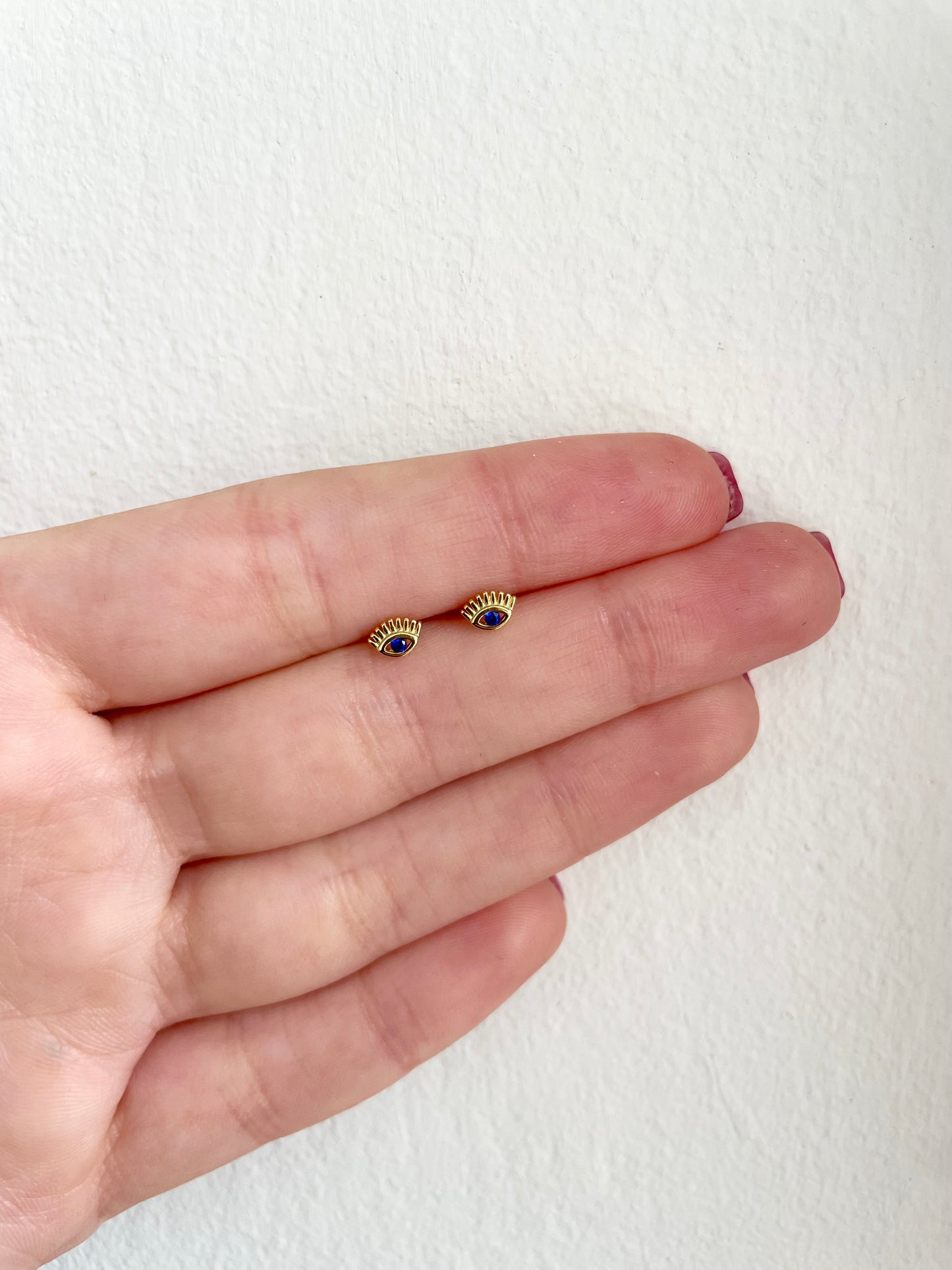 Golden eye earring